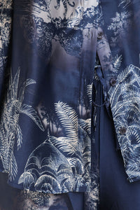 Navy blue shirt with white floral and leaf pattern